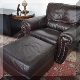 F03. Lane furniture leather nailhead club chair and ottoman. 36”h x 44”w x37”d 